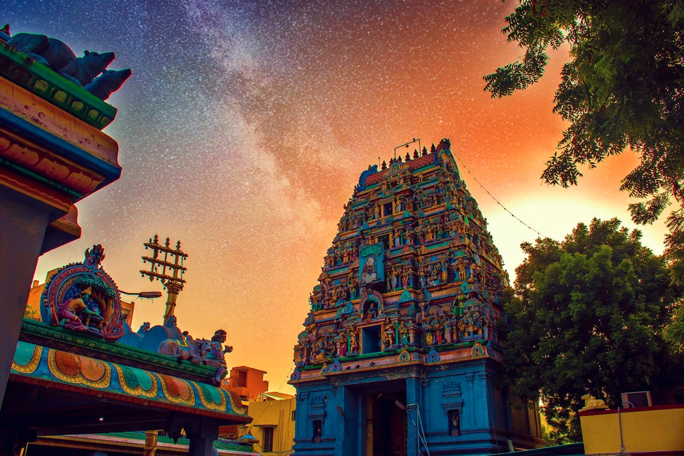 A South Indian temple gopuram lit at night